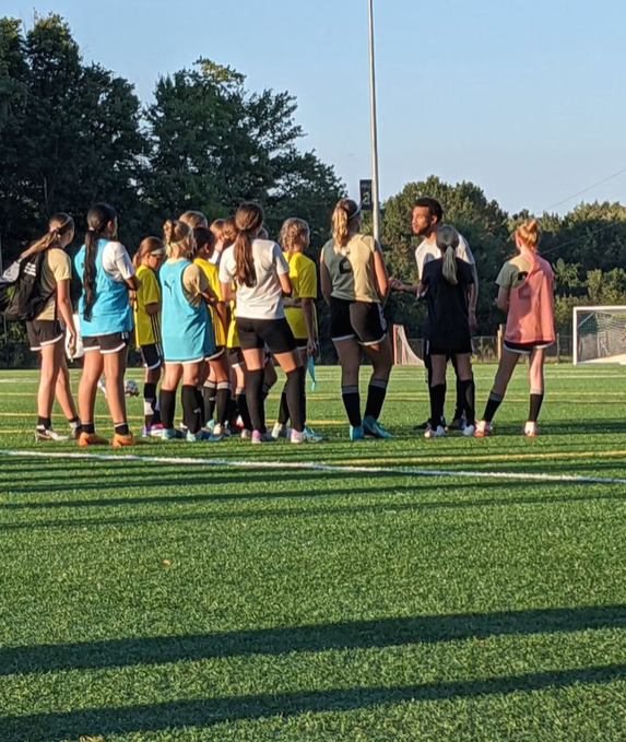 Coach Justin Wilson coaching session